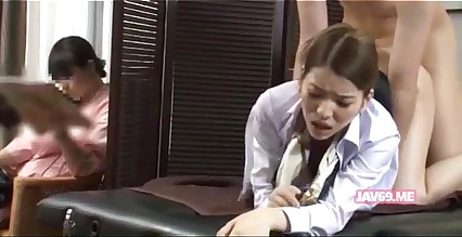 Husband gets massage next to wife